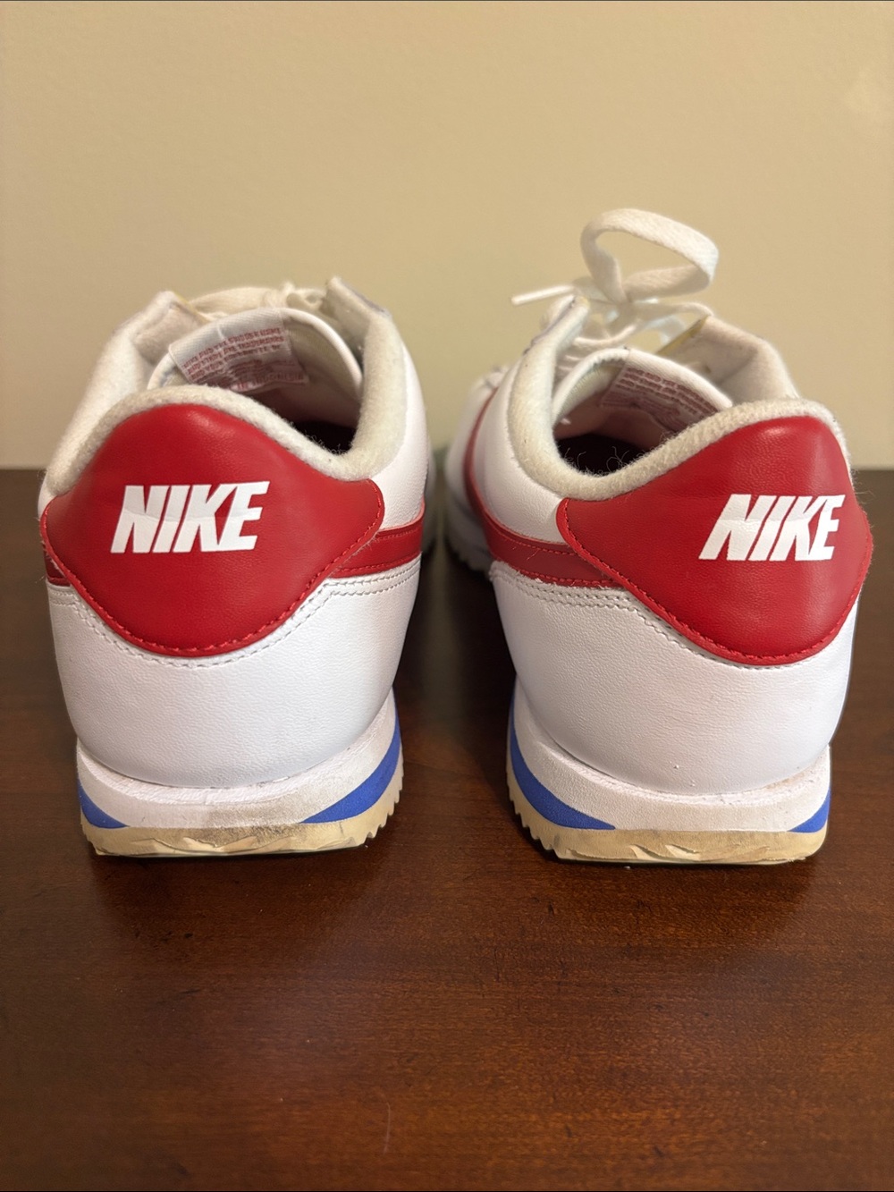 Nike White Sneakers with Red Swoosh and Blue Accent - Picture 4 of 4